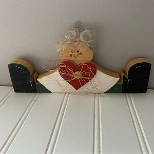 Handcrafted Wooden Figure with Heart Decor